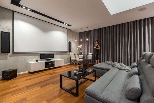 Modern home theater with large projector screen